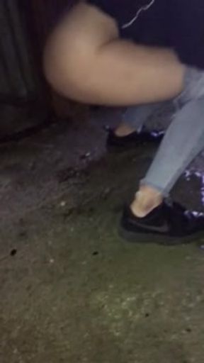 Teen pissing and smoking outside