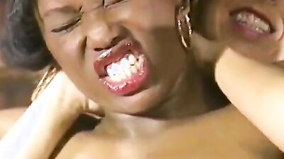 Bombastic ebony and dazzling blonde lesbians wrestle naked and fuck passionately