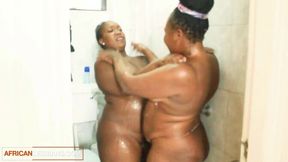 Curvy BBW ebony lesbians lick and finger each other
