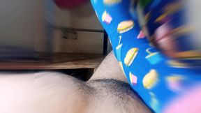 straw with feet wearing very funny stockings