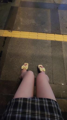 Shemale Ting xuan strolls and pees outdoors.