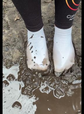 White Calvin Klein socks versus the mud