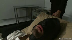 Transgender scientist fucks man in gimp mask