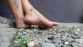 Pronounced arches and dirty soles while I walk through stones (3)