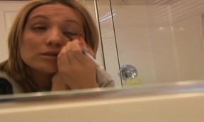 Face make up in the bathroom