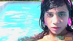 Tobie teen 18+ masturbating outdoors by the pool
