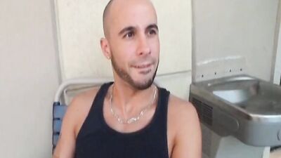 Watch this muscular dude give a hot anonymous blowjob in a bathhouse room