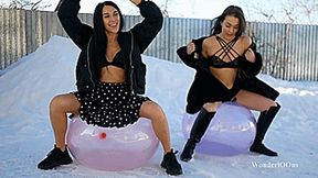 Girls sit pop huge crystal on the snow 4K UHD