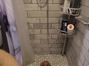 Caged slave drinks his own piss in the shower at Sir's request