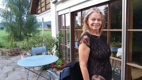A Mature Woman Shows off Her Figure Outside in a Lace Bodysuit!