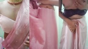 indian gay crossdresser gaurisissy pressing and playing with her big boobs looking in pink saree looking like a housewife