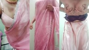 indian gay crossdresser gaurisissy pressing and playing with her big boobs looking in pink saree looking like a housewife