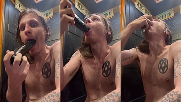 Sucking and gag on black dildo
