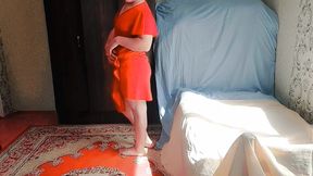 Sweet shemale hugging pillow tightly while smiling shyly