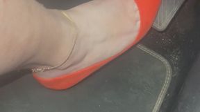 Driving in Bright Orange Heels