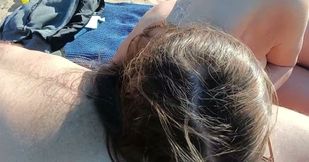 Stepdaughter publicly gives her stepfather a blowjob on the beach.