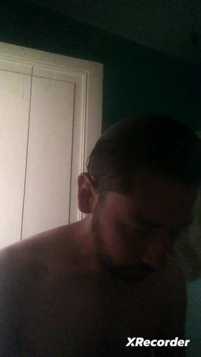 Man does his skincare in the morning