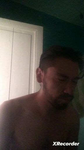 Man does his skincare in the morning