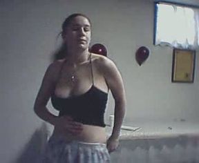 Busty and a bit chubby webcam brunette showing off her juggs