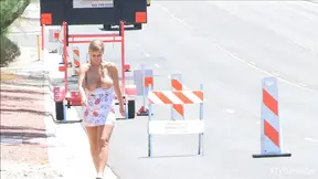 Seductive Busty Blonde Showcases Her Massive Tits In Public Places