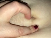 Sexy MILF plays with her bellybutton