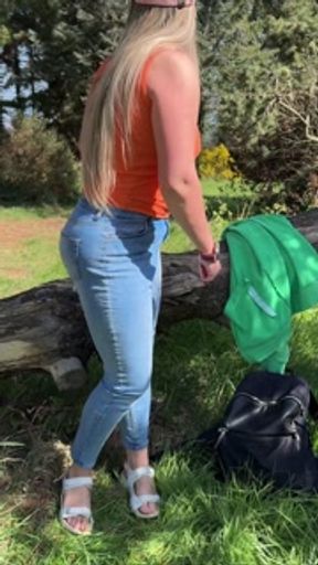 Desperate public wetting jeans in the park