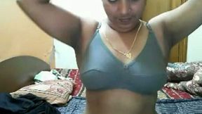 Lovely amateur busty Delhi girl undresses on webcam