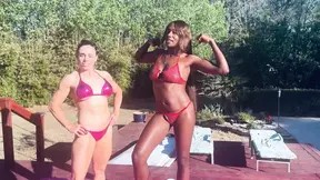 Two toned women engage in lustful lesbian wrestling