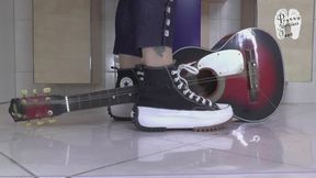 Guitar under Chucks Sneakers