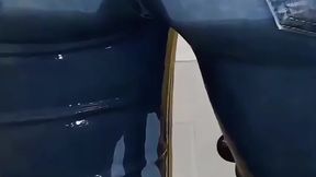 Sexy Asian MILF pees on jeans in her kitchen