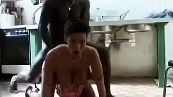 Big tits brunette housewife gets fot BBC fuck in the kitchen