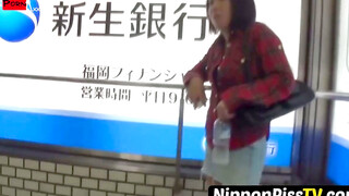 NipponPissTV.com - Amateur Oriental businesswoman caught pissing by voyeur in public