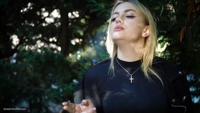 Hot Blonde Babe Smoking Two Black Cigarettes in Nature