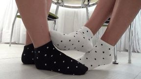 footsie in socks and wiggling toes FP