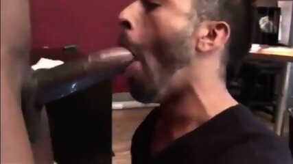 He sucks a big black cock