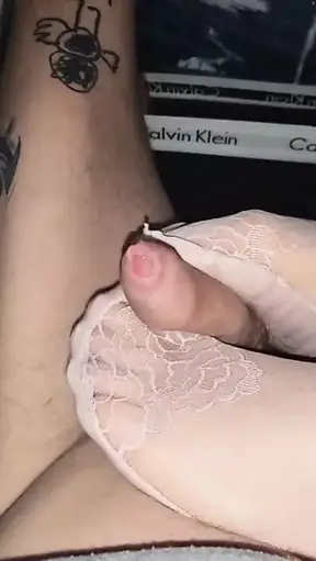 Nylonfeet teasing cock under Pants