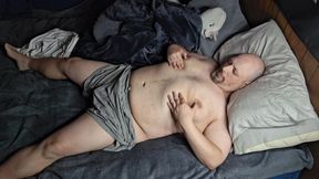 Chubby Guy Lays in Bed and Cums