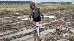 Knee high white socks in mud, messy socks, dirty white socks, ruined socks in mud, dirty white scoks