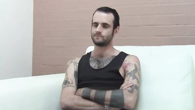 Inked and skinny amateur strips after an interview and jerks off