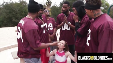 College cheerleader takes on the entire rival football team in gangbang audition