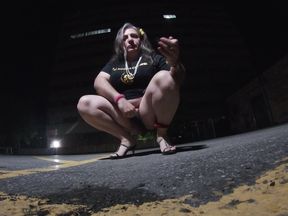 Solo feminized Mature CD goes for a walk in a parking lot