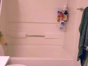 chubby redhead scrubs filthy bathroom with rubber gloves