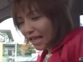 Japanese MILF uses a remote control vibrator in public and blows