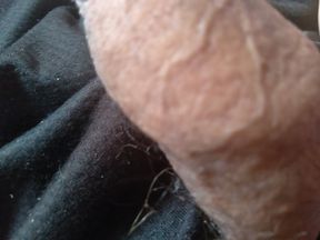 man manipulating his tremendous veiny penis