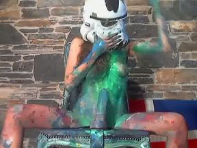 This webcam girl is covered in paint as she rides her dildo like crazy