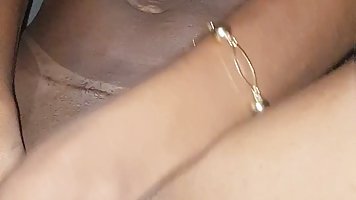 Amateur black MILF masturbates with cucumber