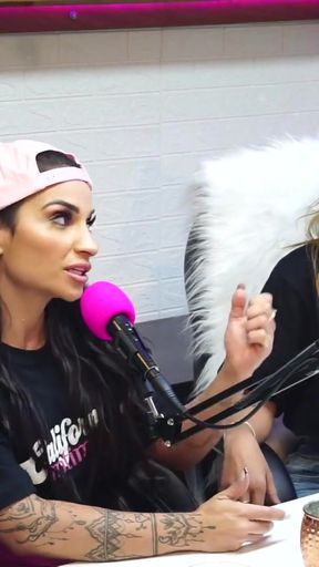 Captivating moment from &quot;Flavia Oliver performs oral sex on Natasha Steffens during the recording of the California Podcast&quot;