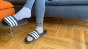 SOCKED FEET DANGLING IN OVERSIZED SLIPPERS - MOV HD