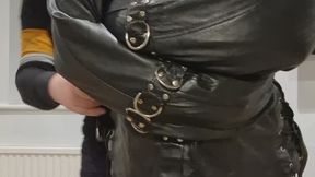 Heavy leather straitjacket try on