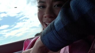 Brunette with nice tits is going to suck dick in a car